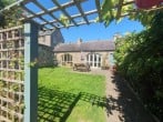 Primrose Cottage with trellis